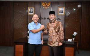 Menteri Transmigrasi (Mentrans) M. Iftitah Sulaiman Suryanagara dan Kepala Badan Gizi Nasional (BGN) Dadan Hindayana